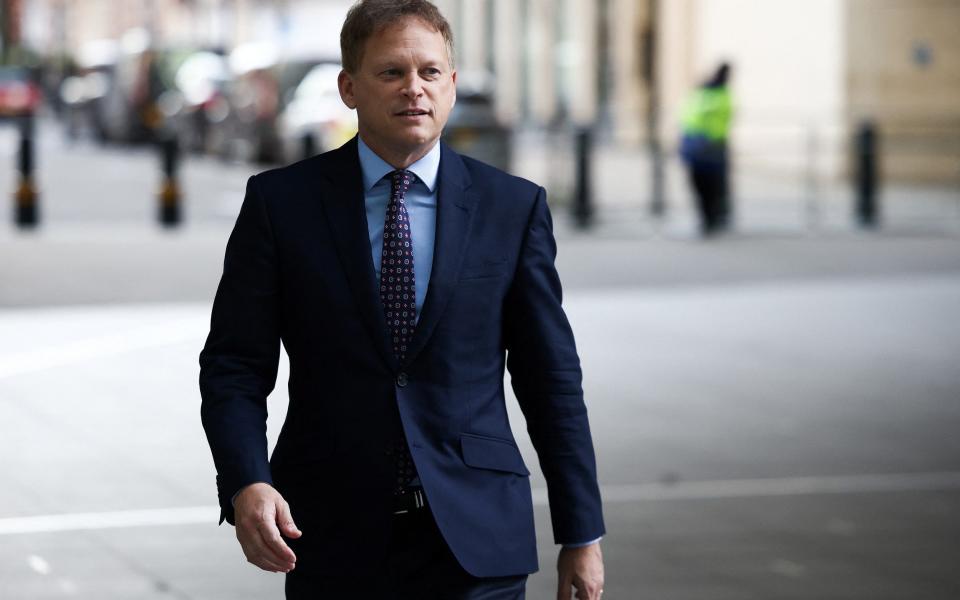 Grant Shapps, the Business Secretary, is pictured arriving at the BBC headquarters on February 5 - Henry Nicholls /Reuters 