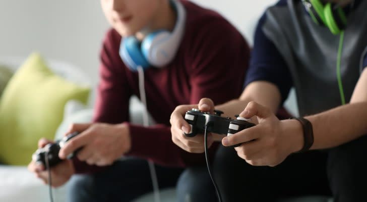 Image of two boys playing video games