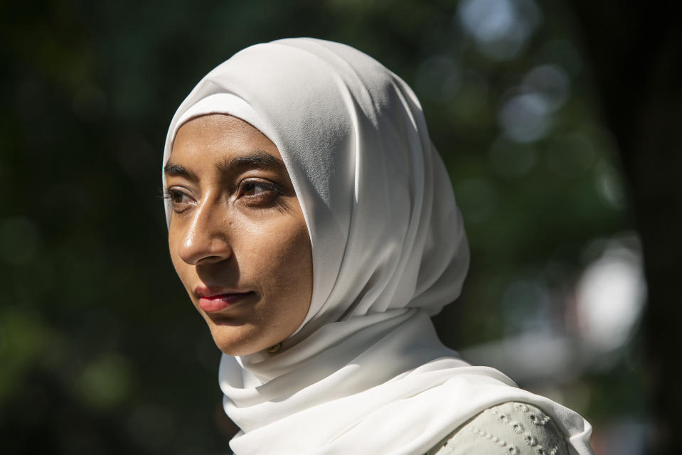 Ameena Ahmed poses for a photo, Tuesday, July 27, 2021, in the Brooklyn borough of New York. After her work as a substitute teacher in New York City dried up, Ameena Ahmed got a welcome $4,200 boost last summer in federal pandemic-related unemployment benefits.Then New York state started taking it back. (AP Photo/Eduardo Munoz Alvarez)