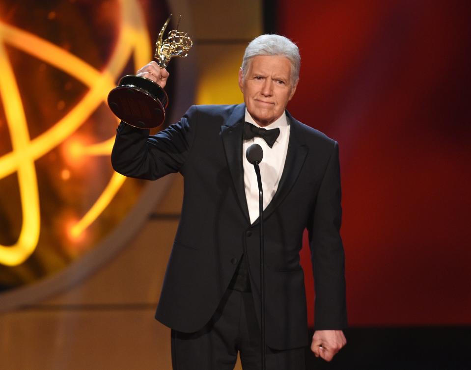 "Jeopardy!" host Alex Trebek receives his six Emmy for outstanding game show host at the 46th annual Daytime Emmy Awards in May 2019.