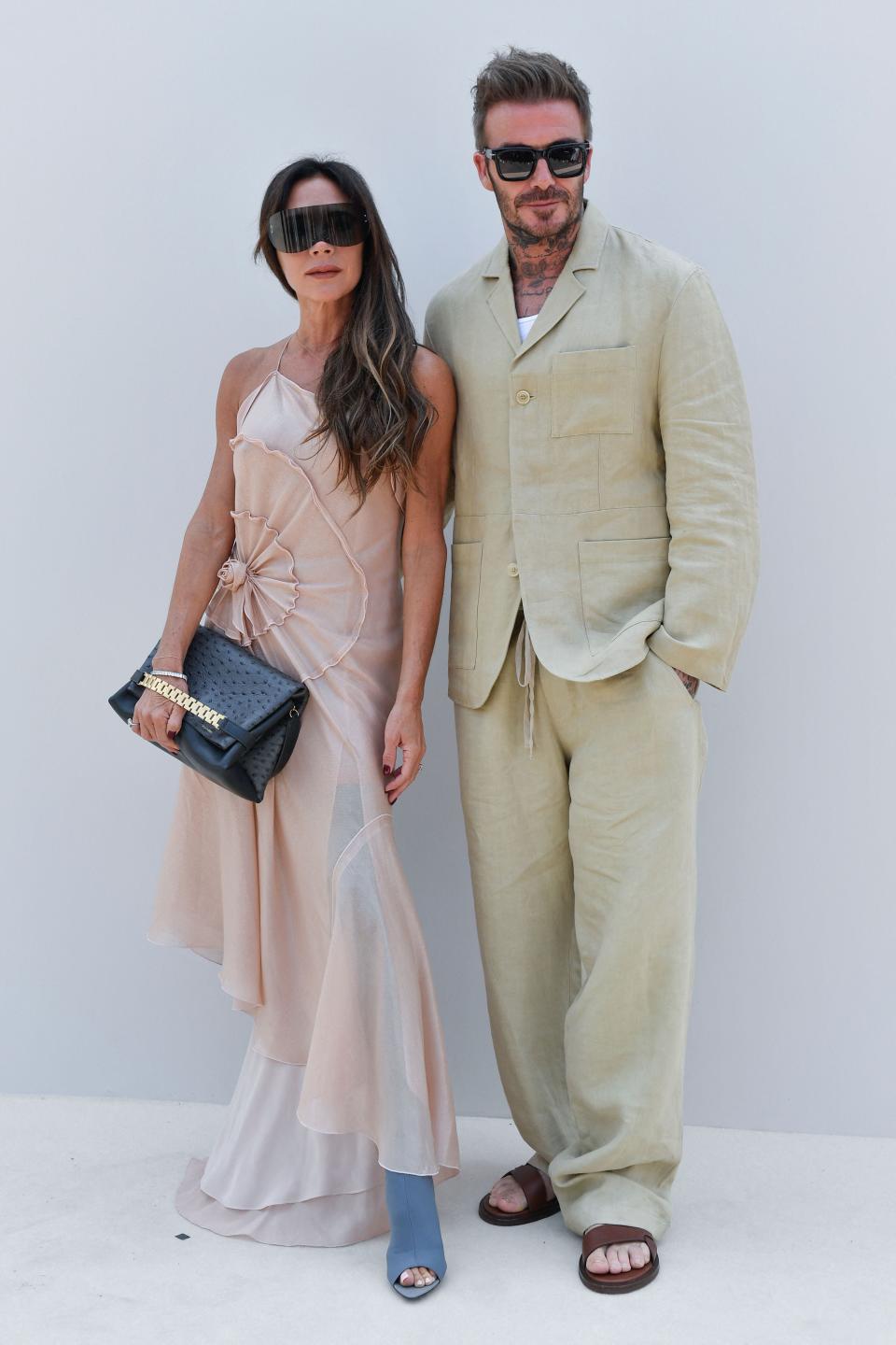 David Beckham and Victoria Beckham at the Jacquemus Menswear Spring-Summer 2024 show at Paris Fashion Week on June 26, 2023.