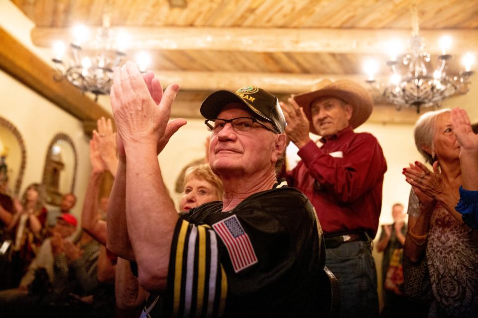 A crowd listens to gubernatorial candidate Mark Ronchetti speak during a campaign event on Wednesday, Oct. 5, 2022, at La Posta de Mesilla.
