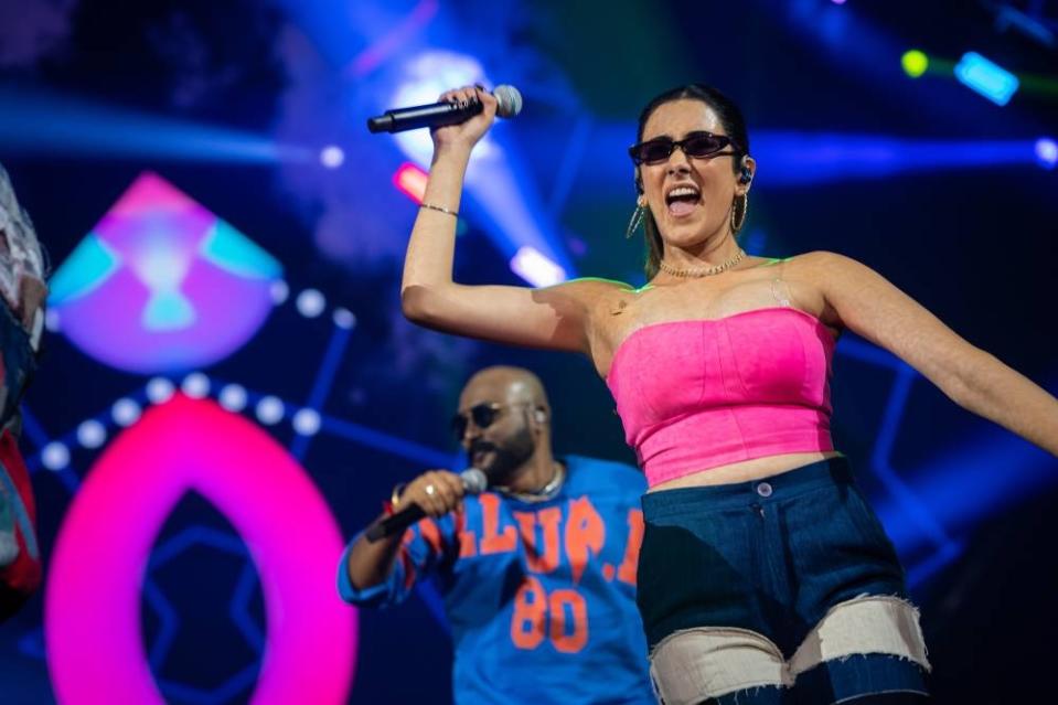 Fan favourite, Jonita Gandhi (right) and playback singer cum hype-man Yogi Sekar (left) while performing at the concert. — Pic by: Mc Entertainment.
