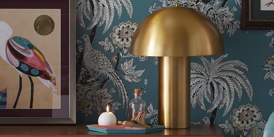 room, furniture, lampshade, wallpaper, wall, lamp, interior design, lighting accessory, table, pattern,