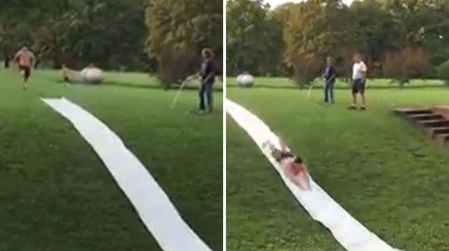 The man gets a good run-up and flies down the slide. Source: Jukin Media