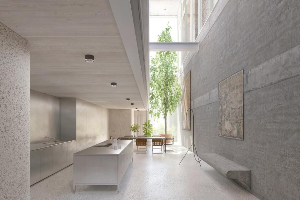 The architect’s design features textured concrete walls (The Modern House)