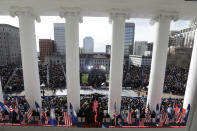 Virginia Gov. Glenn Youngkin is sworn into office as his wife Suzanne looks on at the Capitol Saturday Jan. 15, 2022, in Richmond, Va. (AP Photo/Steve Helber)