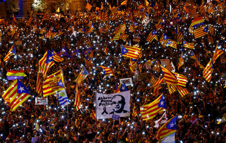 People take part in a rally of Catalan separatist organisations to demonstrate against the trial of Catalan leaders and call for self-determination rights, in Madrid, Spain March 16, 2019. Banner reads "Freedom for political prisoners". REUTERS/Juan Medina