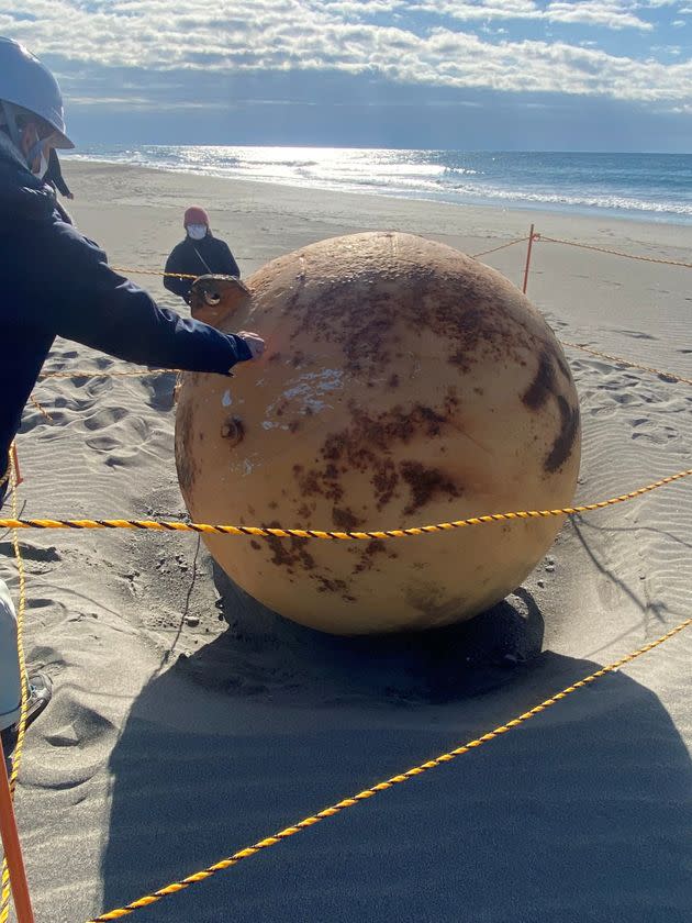 A ball is seen on a beach in Hamamatsu, Japan.