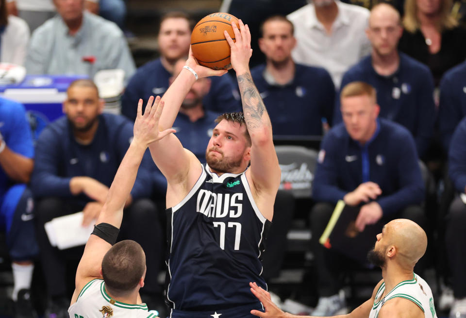 DALLAS, TEXAS - JUNE 14: Luka Doncic #77 of the Dallas Mavericks shoots the ball during the second quarter against the Boston Celtics in Game Four of the 2024 NBA Finals at American Airlines Center on June 14, 2024 in Dallas, Texas. NOTE TO USER: User expressly acknowledges and agrees that, by downloading and or using this photograph, User is consenting to the terms and conditions of the Getty Images License Agreement. (Photo by Stacy Revere/Getty Images)