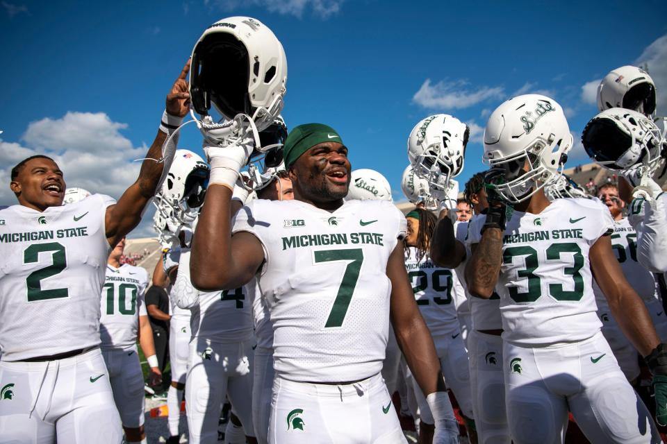 Michigan State Spartans DB Michael Dowell (7) sings with his team to the fans after the game Oct. 16, 2021 against the Indiana Hoosiers at Memorial Stadium.