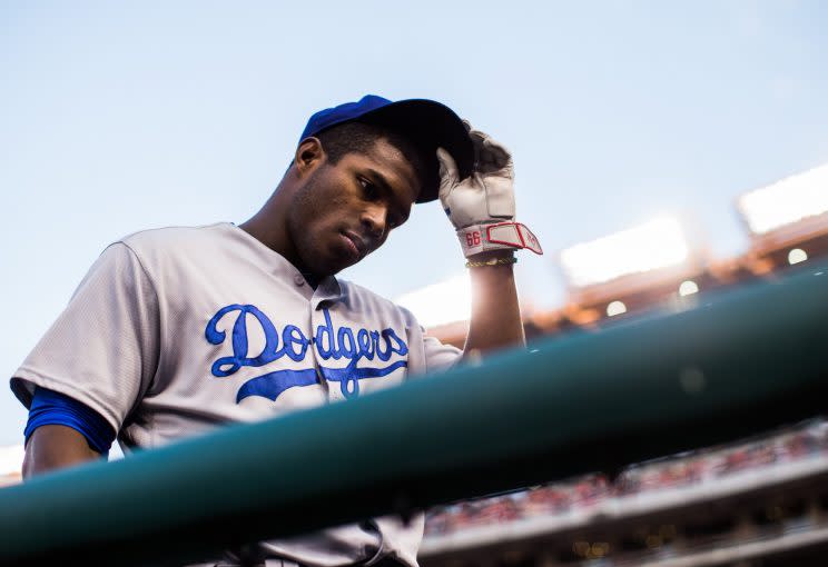 Yasiel Puig is in hot water after posting video of him partying with teammates on social media. (Getty Images/Rob Tringali/Sportschrome)