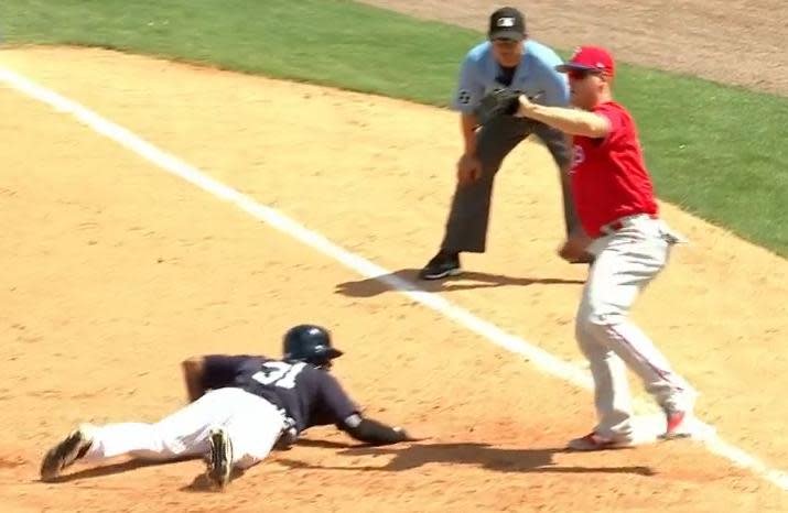 Aaron Hicks of the Yankees comes up just a bit short with his slide. Would Tommy Jospeh of the Phillies realize it in time? (MLB.TV)