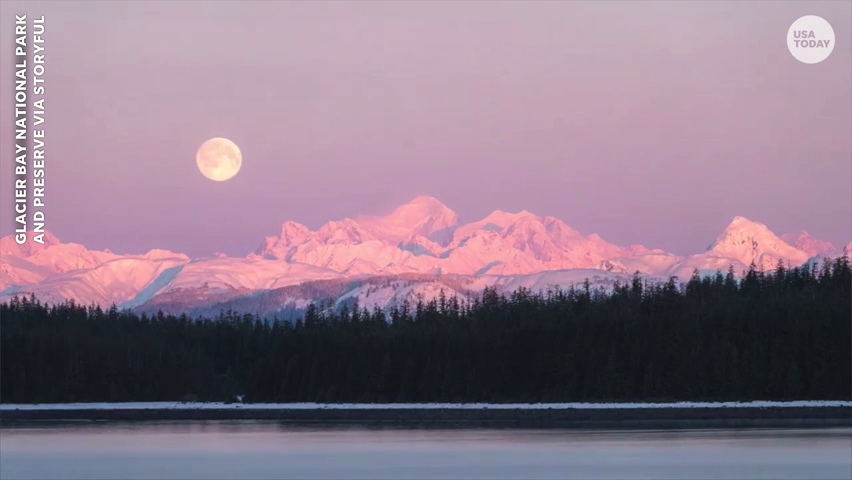 February's full moon, known as the Snow Moon, disappeared behind beautiful Mount Fairweather in Alaska in a stunning moonset.