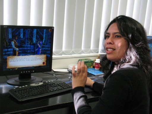 Maru Nihoniho, managing director of Metia Interactive, work on the SPARX video game in Wellington. The video game attempts to teach teenagers how to deal with depression using a psychological approach known as cognitive behavioural therapy