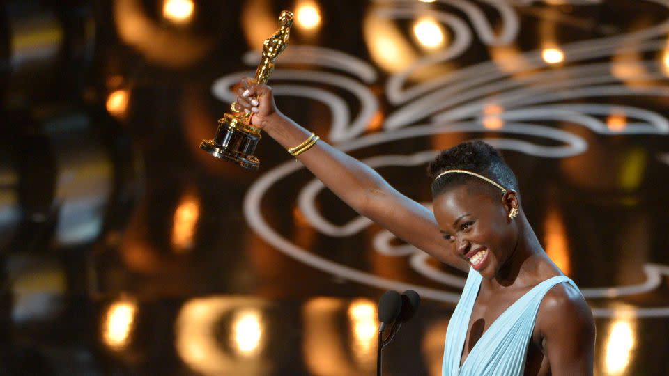 Lupita Nyong'o accepting the award for best actress in a supporting role for "12 Years a Slave" during the Oscars in 2013. - John Shearer/Invision/AP