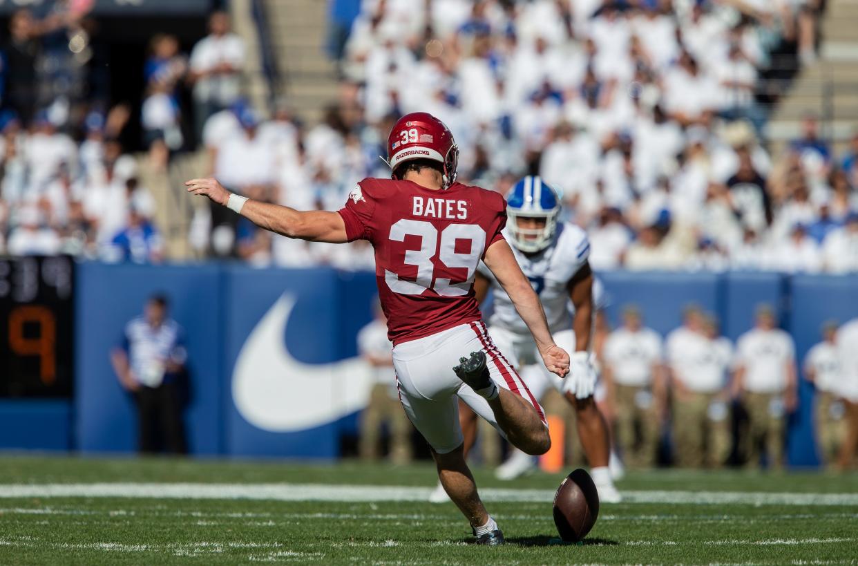 Jake Bates of the Arkansas Razorbacks kicks off to the Brigham Young Cougars during the first half on Oct. 15, 2022 at LaVell Edwards Stadium in Provo, Utah.