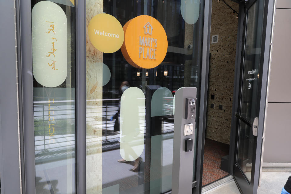 The entrance to Mary's Place, a family homeless shelter located inside an Amazon corporate building on the tech giant's Seattle campus, is shown Wednesday, June 17, 2020. The shelter marks a major civic contribution bestowed by Amazon to the hometown it has rapidly transformed. But the facility also serves as a stark display of haves-and-have-nots, given that some blame Amazon's explosive growth over the past decade for making living in Seattle too costly for a growing number of people. (AP Photo/Ted S. Warren)