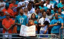 <p>Fans stand for a moment of silences for Miami Marlins Pitcher Jose Fernandez prior to a game between the Miami Dolphins and the Cleveland Browns on September 25, 2016 in Miami Gardens, Florida. Fernandez was killed in a boating accident early this morning. (Photo by Marc Serota/Getty Images) </p>