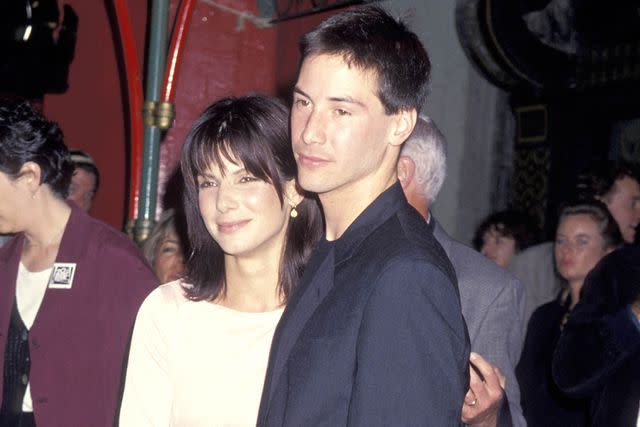 <p>Ron Galella/Ron Galella Collection via Getty</p> Sandra Bullock & Keanu Reeves in 1994