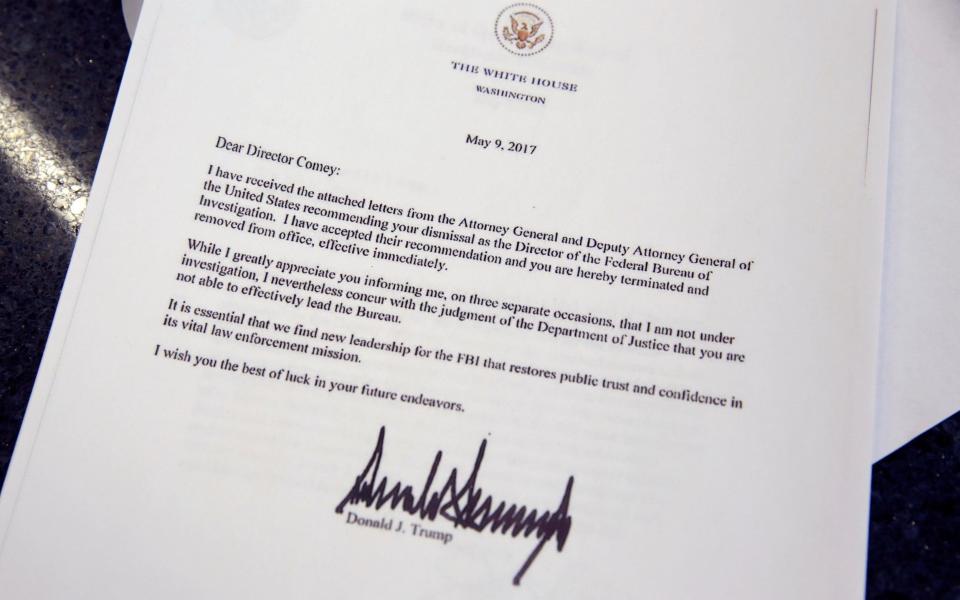 This picture shows a copy of the letter by US President Donald Trump firing Director of the FBI James Comey at the White House in Washington - Credit: REUTERS