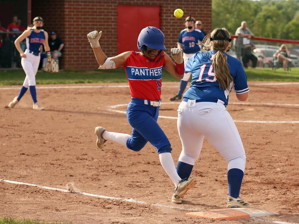 Licking Valley's D'Neya Dennis beats the throw to first during the Panthers' 10-0 victory against visiting Highland in a Division II second-round game on Wednesday, May 8, 2024.