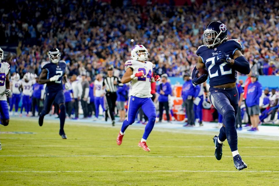 Tennessee Titans running back Derrick Henry (22) runs for a 76-yard touch down against the Bills at Nissan Stadium Monday, Oct. 18, 2021 in Nashville, Tenn. 