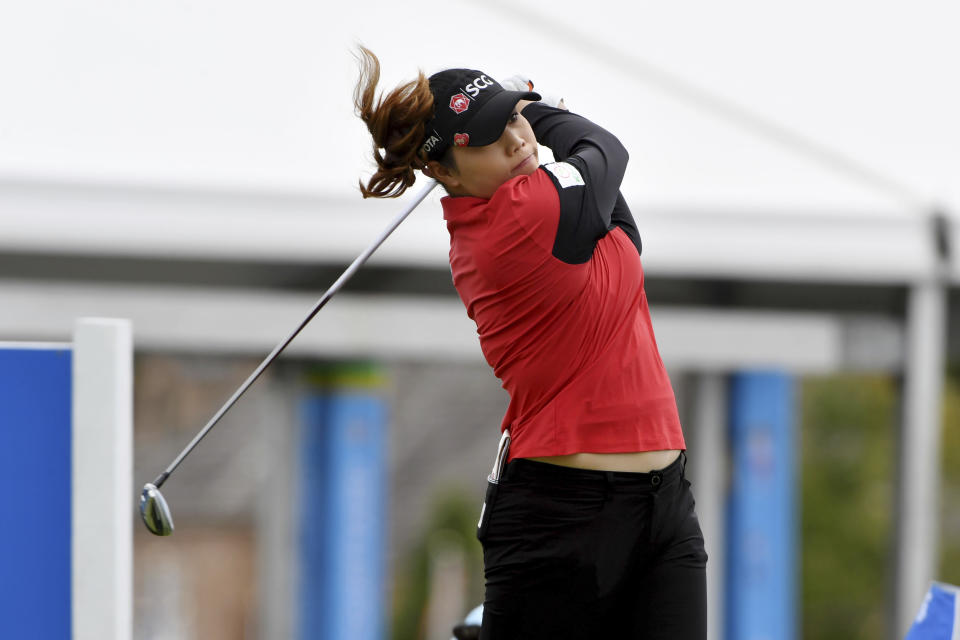 Ariya Jutanugarn, of Thailand, hits from the 18th tee during the first round of the LPGA Walmart NW Arkansas Championship golf tournament, Friday, Sept. 24, 2021, in Rogers, Ark. (AP Photo/Michael Woods)