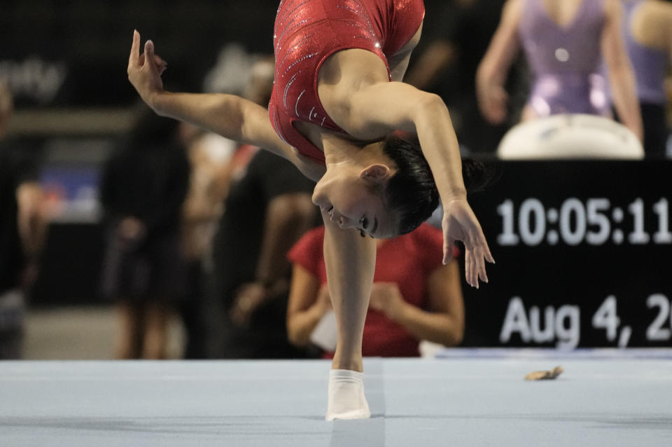 Suni Lee practices on the floor exercise at the U.S. Classic gymnastics competition Friday, Aug. 4, 2023, in Hoffman Estates, Ill. (AP Photo/Morry Gash)