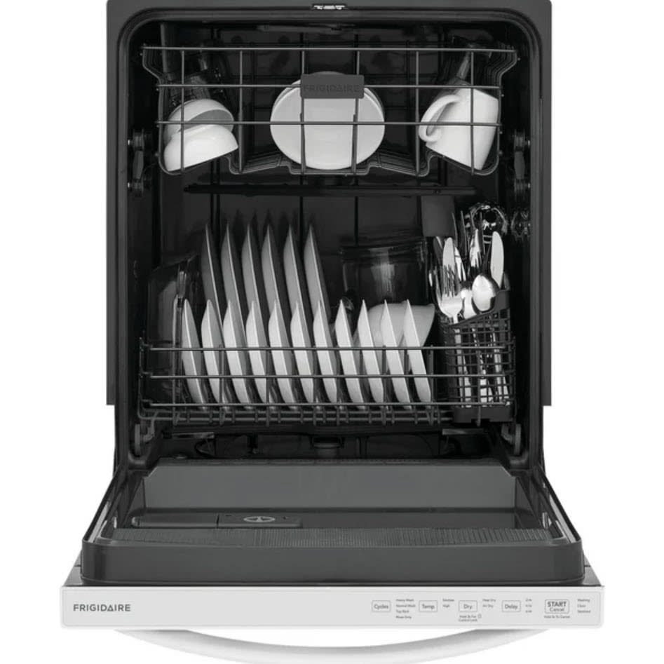 Open dishwasher with plates, cups, and utensils on racks