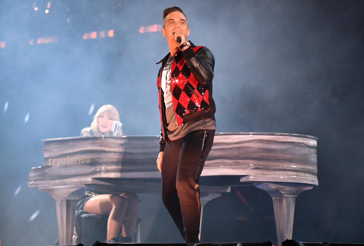 LONDON, ENGLAND - JUNE 23:  Taylor Swift and Robbie Williams perform on stage during the reputation Stadium Tour at Wembley Stadium on June 23, 2018 in London, England.  (Photo by Gareth Cattermole/TAS18/Getty Images for TAS)