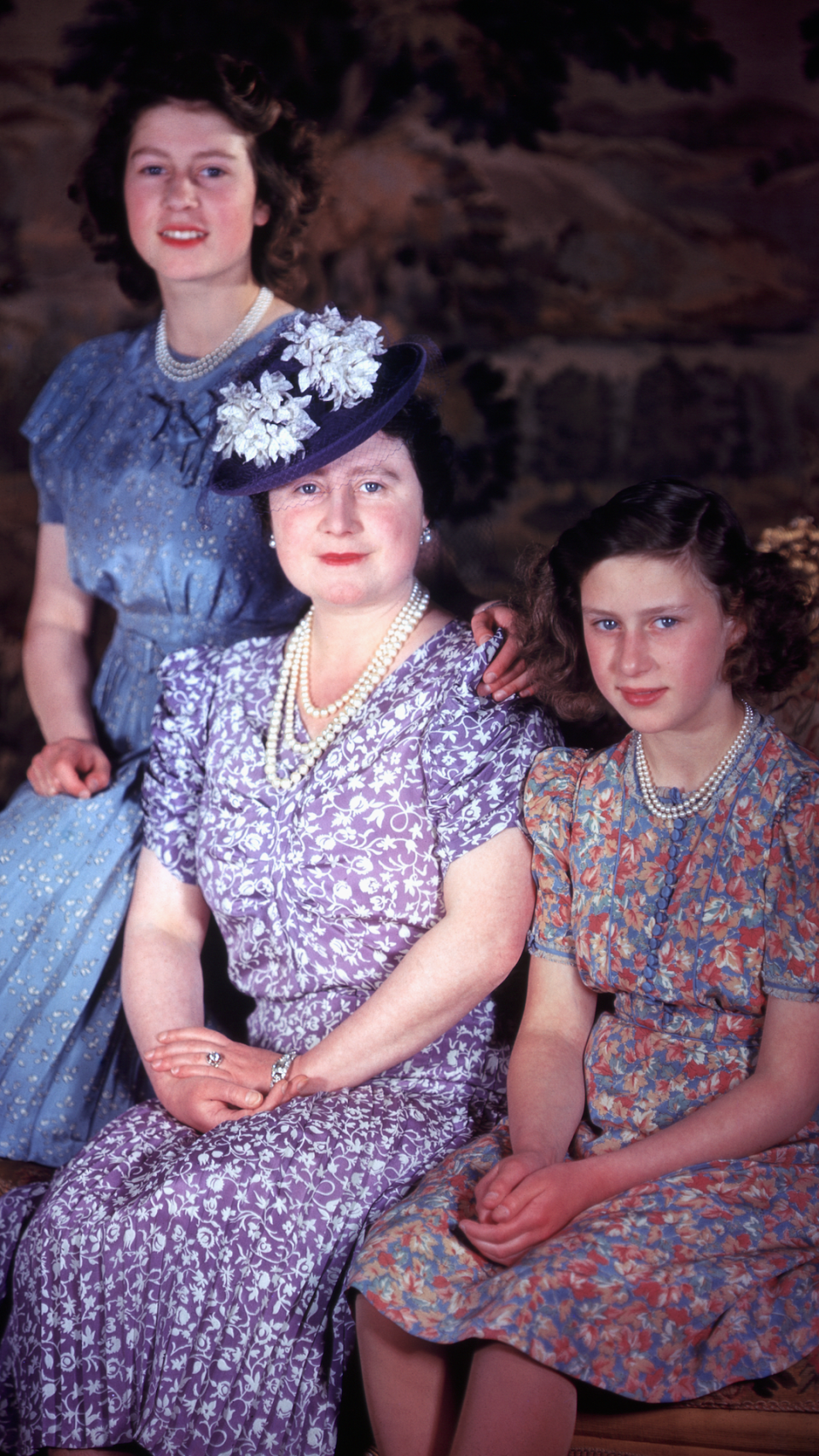 Queen Elizabeth and Princess Margaret sitting for a portrait