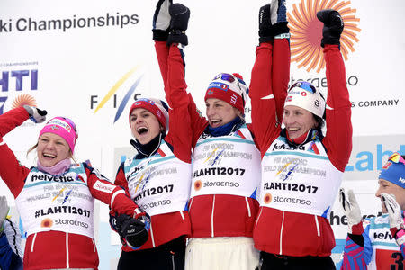 Maiken Caspersen Falla, Heidi Weng, Astrid Uhrenholdt Jacobsen and Marit Bjoergen of Norway after the the Ladies cross-country 4 x 5 km relay competition in the FIS Nordic World Ski Championships in Lahti, Finland, on March 2, 2017. Team Norway won the Ladies cross-country 4 x 5 km relay. LEHTIKUVA/Markku Ulander via REUTERS