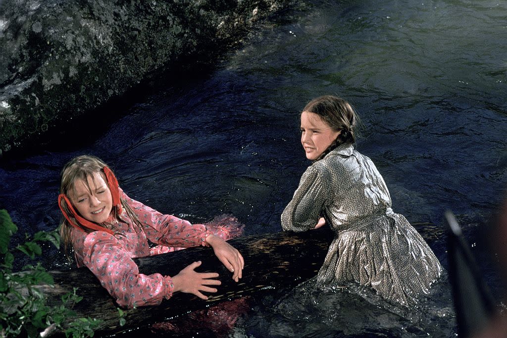 <em>Little House on the Prairie</em> characters Nellie and Laura, pictured in a 1975 episode, are enemies most of the time, but actresses Alison Arngrim and Melissa Gilbert have long been friends. (Photo: NBCU Photo Bank)