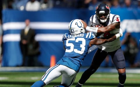 Deshaun Watson (4) is sacked by Indianapolis Colts' Darius Leonard (53) during the first half of an NFL football game - Credit: (AP Photo/Michael Conroy)