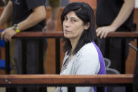FILE - This May 21, 2015 file photo shows Palestinian Parliament member Khalida Jarrar of the Popular Front for the Liberation of Palestine (PFLP) attending a court session at the Israeli Ofer military base near the West Bank city of Ramallah. Palestinian activists and human rights groups have called on Israel to allow the prominent jailed lawmaker to attend her daughter's funeral on Tuesday, July 13, 2021.(AP Photo/Majdi Mohammed, File)