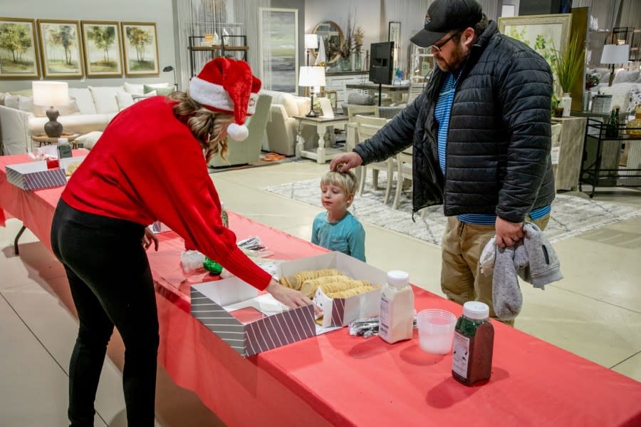 The Angel Tree Christmas Party at Talsma Furniture near Grand Rapids on Nov. 30, 2023. (Michael Buck/WOOD TV8)