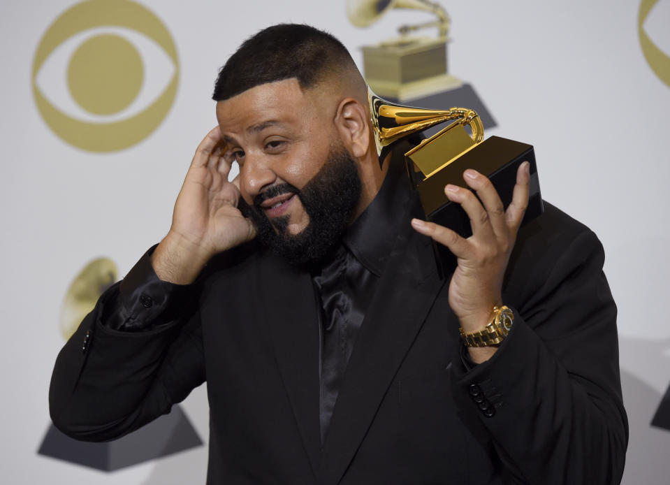 DJ Khaled poses in the press room with the award for best rap/sung performance for "Higher" at the 62nd annual Grammy Awards at the Staples Center on Sunday, Jan. 26, 2020, in Los Angeles. (AP Photo/Chris Pizzello)