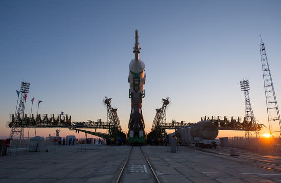 he Soyuz rocket is erected into position after being rolled out to the launch pad by train on Monday, December 17, 2012, at the Baikonur Cosmodrome in Kazakhstan.