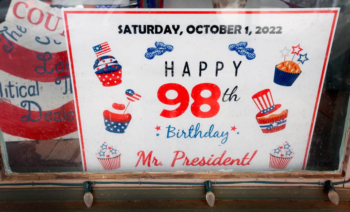 A sign in a merchant’s window along Main Street in downtown Plains, Georgia congratulates for U.S. President Jimmy Carter on his 98th birthday on Oct. 1, 2022. 02/21/2023