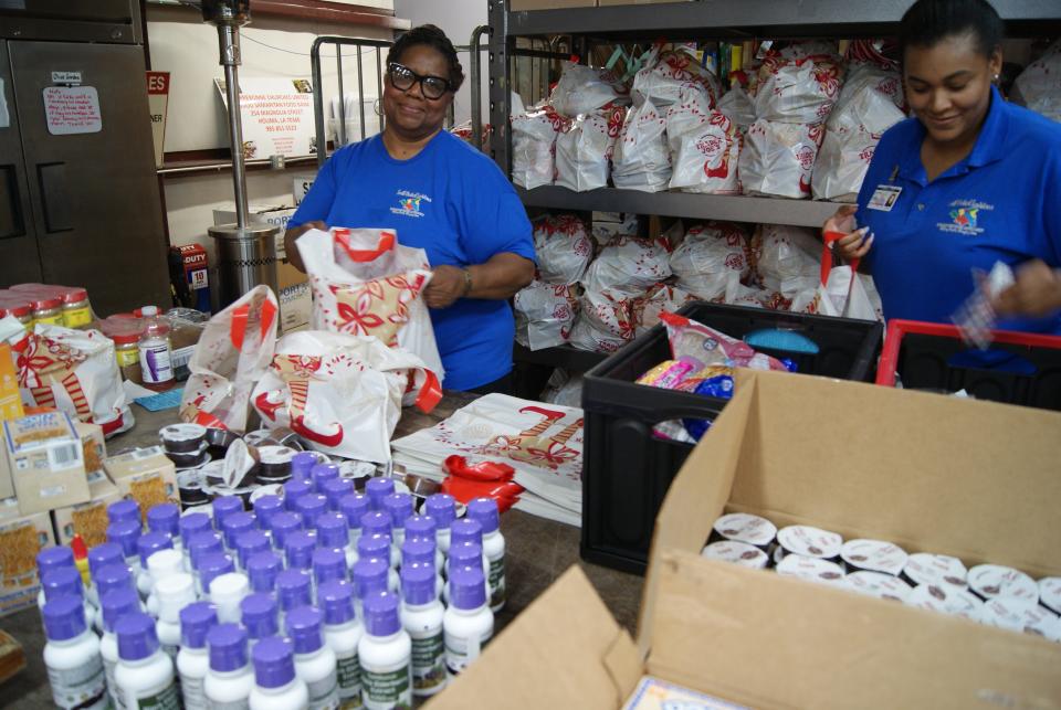 Packing snack bags for recipients Wednesday, June 1, 2022, at the Terrebonne Churches United Food Bank in Houma are volunteers Veda Bailey, 60, of Vacherie, and Lauren Owens, 28, of Thibodaux.