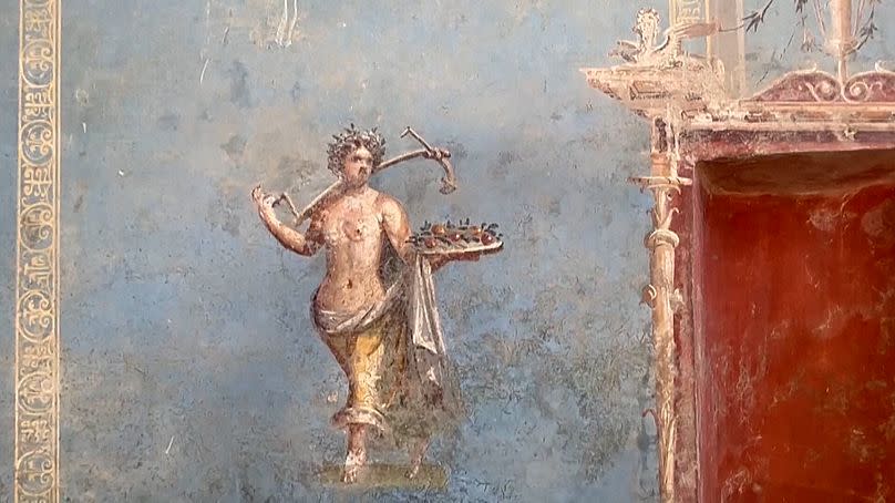 Closeup of a fresco depicting a female figure recently excavated in Pompeii