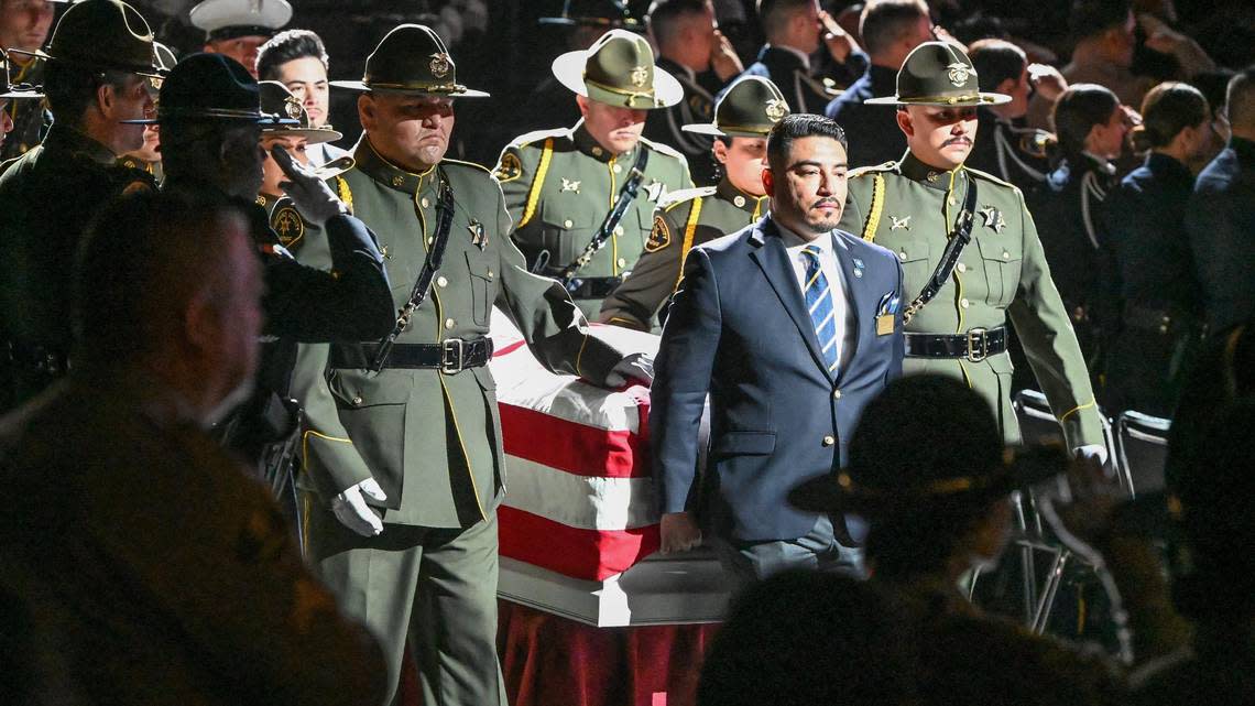 Officer Gonzalo Carrasco Jr.’s casket is escorted into the funeral service at Selland Arena on Thursday morning, Feb. 16, 2023.