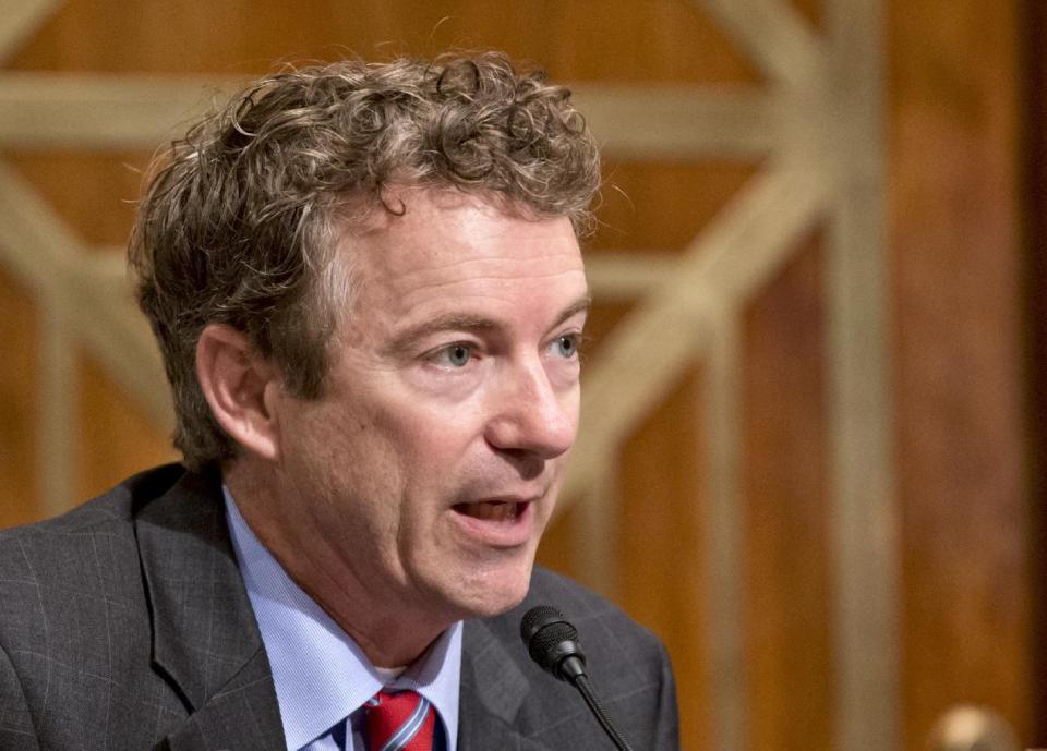 FILE - In this Nov. 6, 2013 file photo, Sen. Rand Paul, R-Ky. speaks on Capitol Hill in Washington. As the Obama era nears its final midterm elections, the campaign to succeed him has already begun: Prospective candidates on both sides have been quietly courting donors, taking steps to build an organization and making scouting trips to early voting states like Iowa, New Hampshire and South Carolina. The official starting line, however, is likely a year away. (AP Photo/J. Scott Applewhite, File)