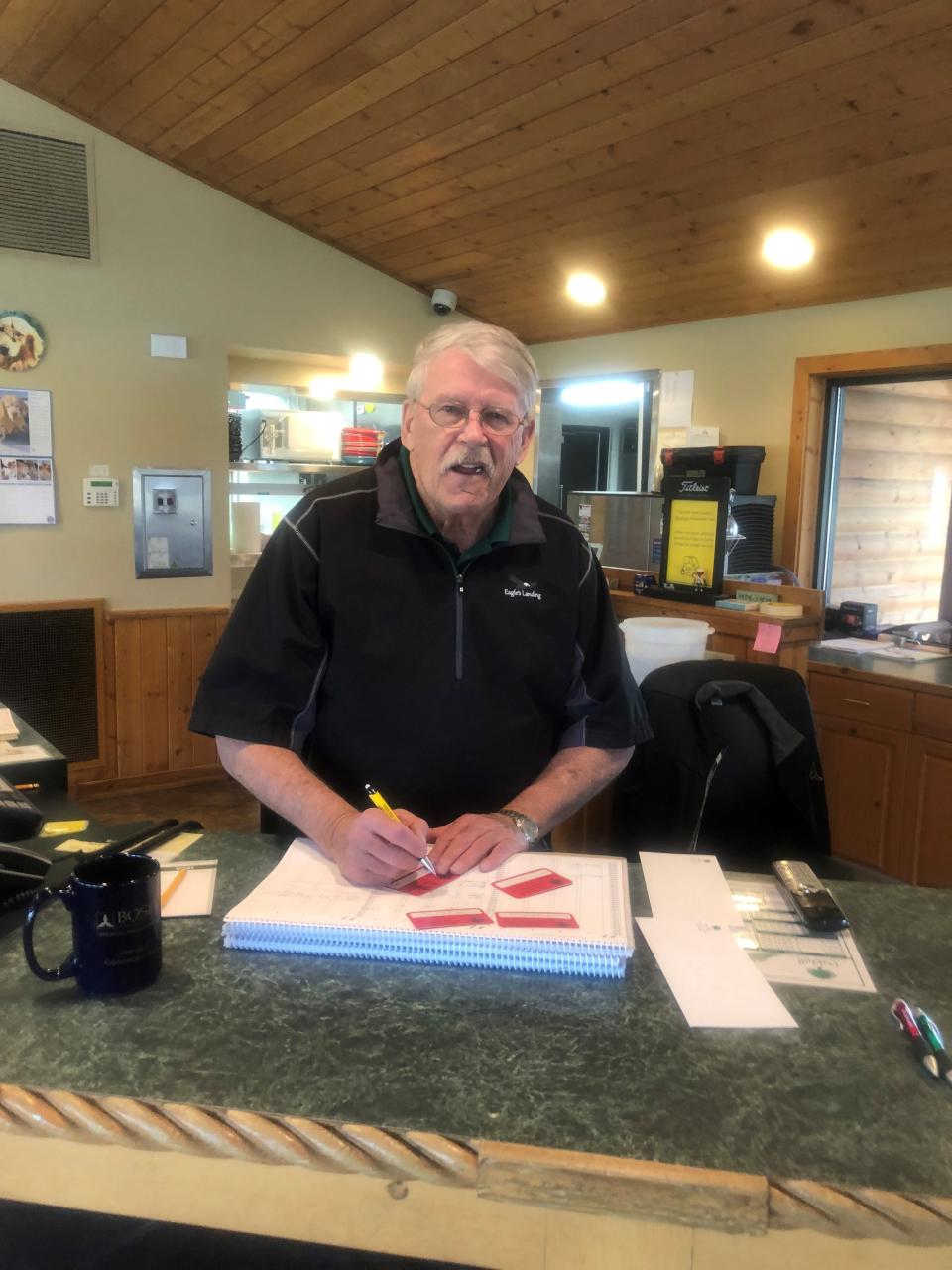 Owner Jim Dahl behind the counter at Oak Hill Gold Course in Rice.