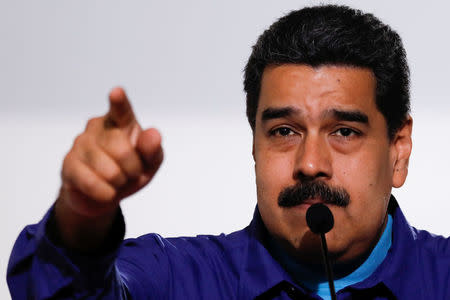 Venezuela's President Nicolas Maduro talks to the media before an event with supporters of Somos Venezuela (We are Venezuela) movement in Caracas, Venezuela February 7, 2018. REUTERS/Marco Bello