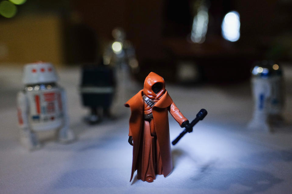STOCKTON-ON-TEES, ENGLAND - DECEMBER 01: A rare Jawa Sandcrawler figure wearing a vinyl cape forms part of a huge collection of a Star Wars memorabilia and collectables displayed ahead of an auction at Vectis Auction House on December 1, 2015 in Stockton-on-Tees, England. Thousands of toys, merchandise and items related to the Star Wars movie series are due to go to auction next week with hundreds of collectors and movie fans expected to attend the event or bid online at the Teesside based auction house. (Photo by Ian Forsyth/Getty Images)