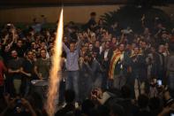 <p>A flare is let off as cowds gather to await the result of the Indepenence Referendum. (Getty) </p>