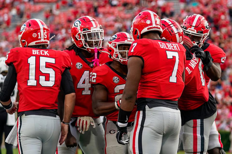 Oct 15, 2022; Athens, Georgia, USA; Georgia Bulldogs tight end Arik Gilbert (7) reacts with teammates after catching a touchdown pass against the Vanderbilt Commodores during the second half at Sanford Stadium. Dale Zanine-USA TODAY Sports