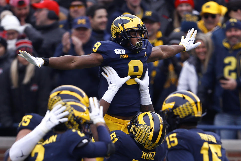 Michigan wide receiver Donovan Peoples-Jones (9) celebrates his 25-yard touchdown reception against Ohio State during the first half of an NCAA college football game in Ann Arbor, Mich., Saturday, Nov. 30, 2019. (AP Photo/Paul Sancya)